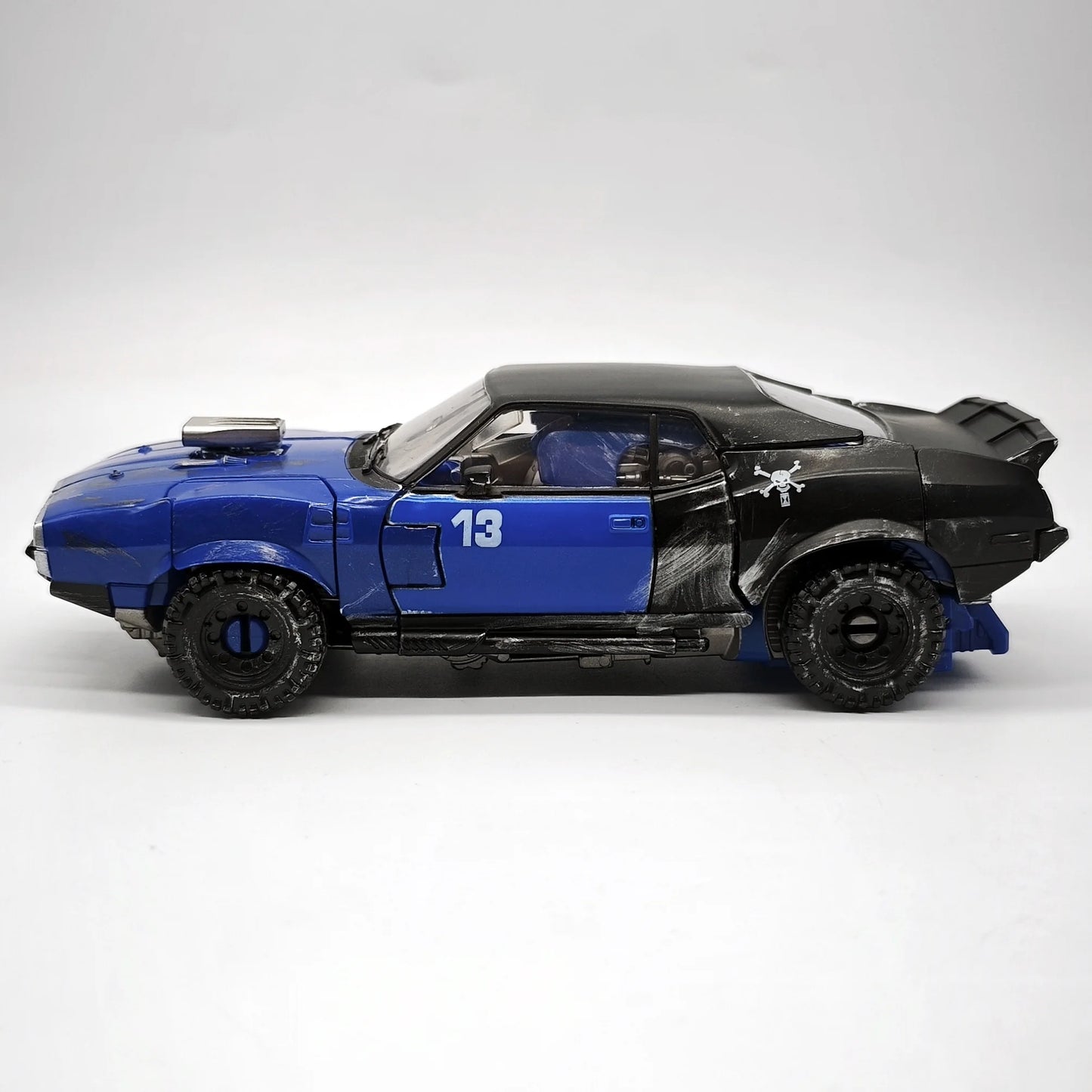 Transformers-figuurtje Dropkick Blauw TW1033 — Gearticuleerde Decepticon-auto