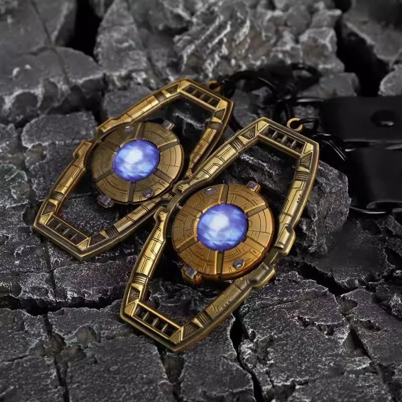 Transformers Optimus Prime Matrix-sleutelhanger — Premium metalen bedeltje met rotsstructuur