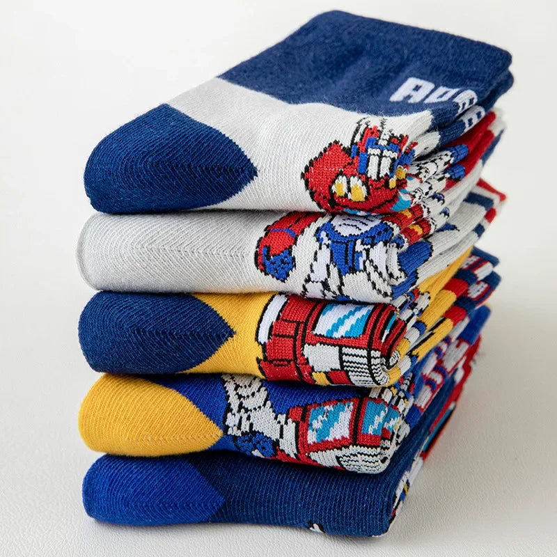 Chaussettes colorées empilées avec motif robot pixelisé, décor jaune, bleu, rouge – Transformers.