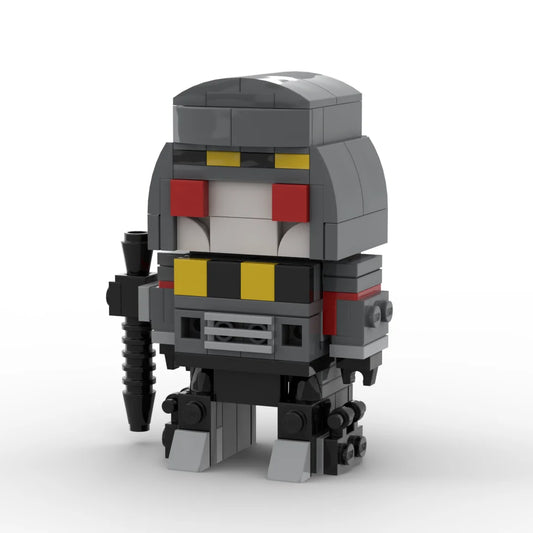 Transformers-figuurtje Megatron IDW-versie als mijnwerker — grijze brick met helm en boor