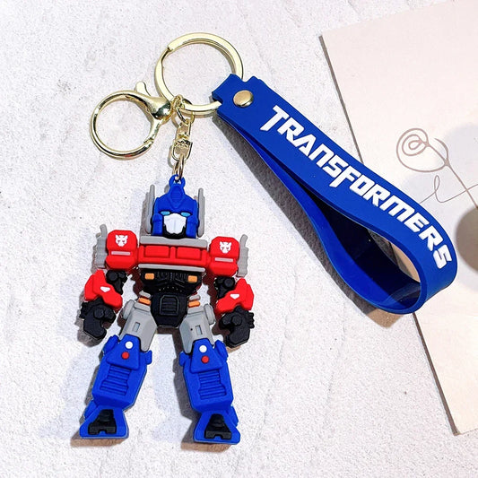 Porte-clés Optimus Prime coloré en plastique, avec lanière bleue TRANSFORMERS – Transformers.