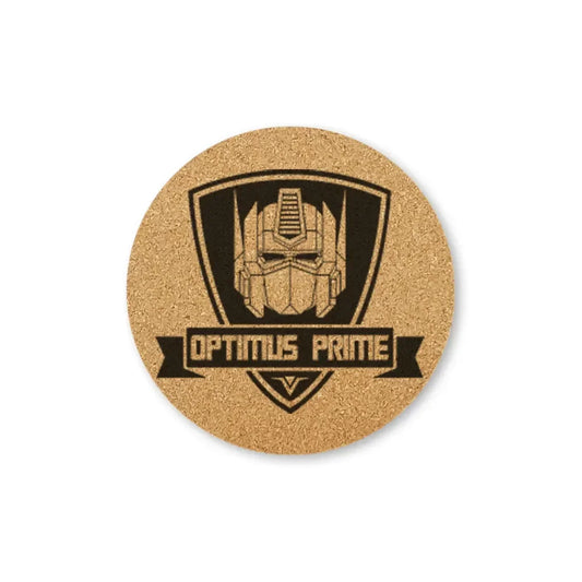 Dessous de verre rond en liège avec visage d’Optimus Prime noir et logo, style geek – Transformers.