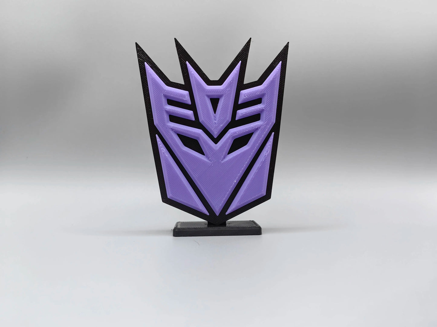 Transformers Decepticon-bord in paars — Bureauaccessoire met embleemsilhouet