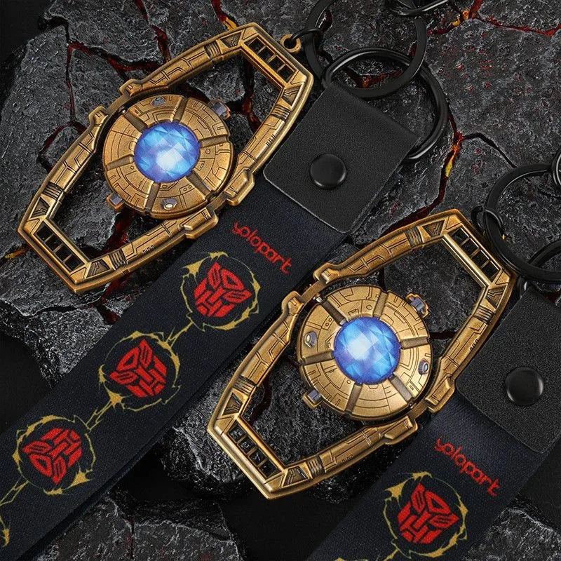 Transformers Optimus Prime Matrix-sleutelhanger — Premium metalen bedeltje met rotsstructuur