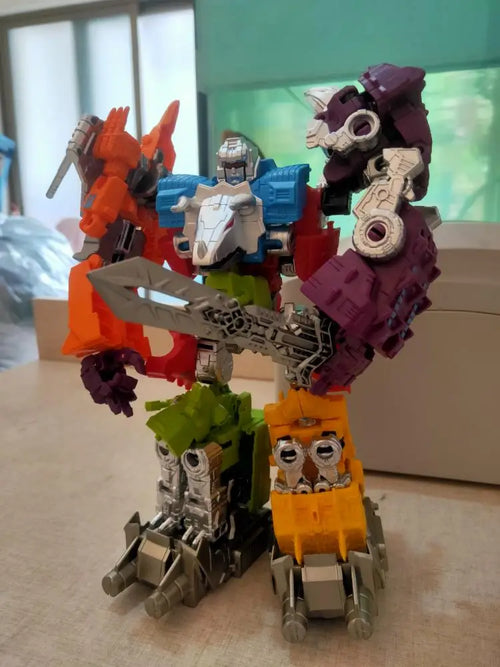 Transformers-figuur Dinoking Photo Réelle — Rood-paarse kleurstelling, zonder doos
