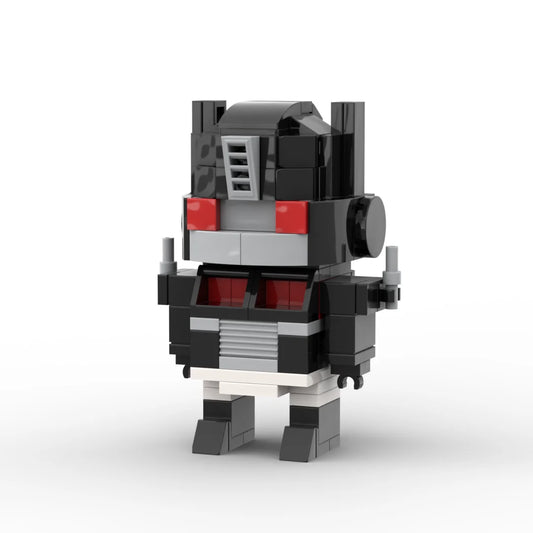 Transformers Nemesis Prime-baksteen — kleine donkergrijze en witte robot